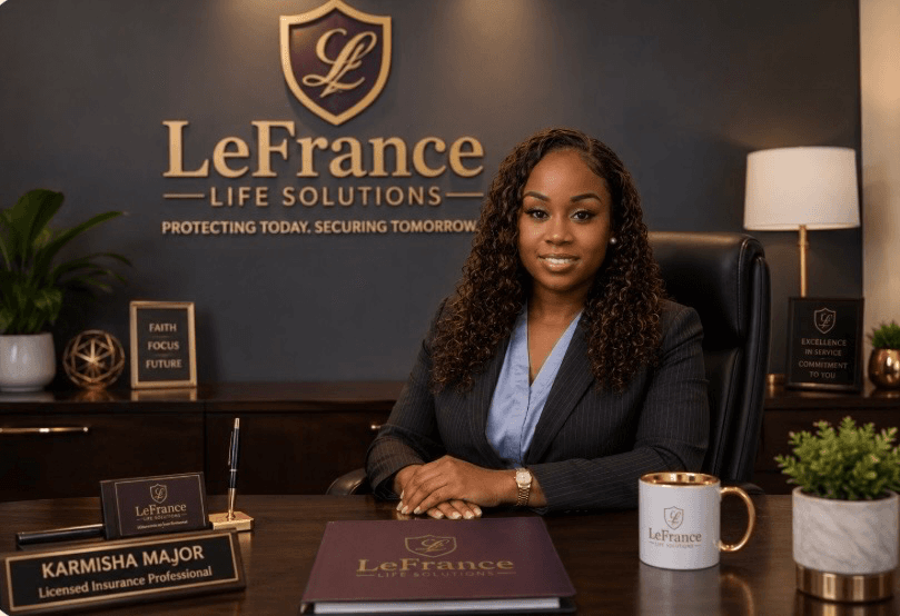 Karmisha Major, Licensed Insurance Professional, at her office desk